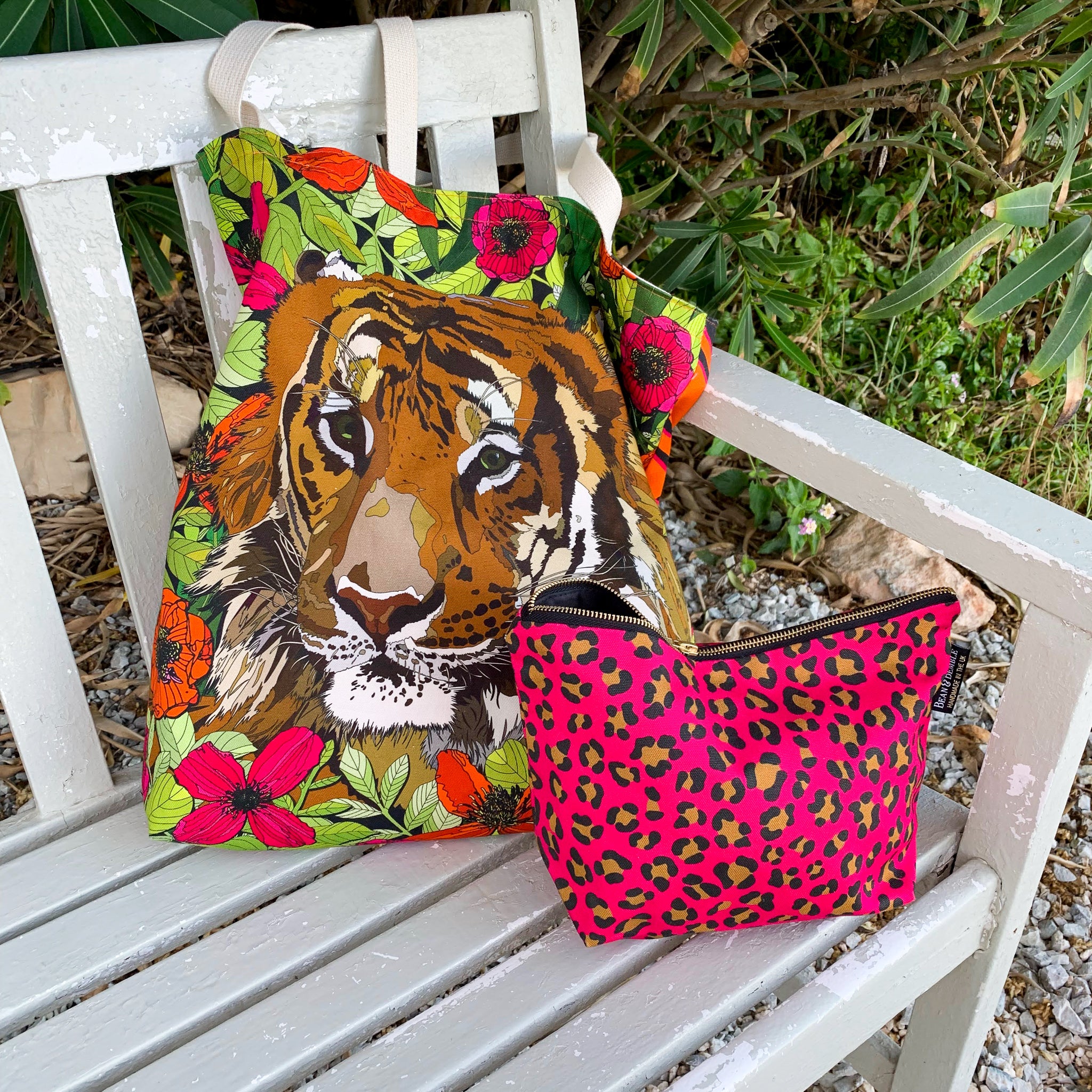 Cotton tiger tote bag and bright pink leopard print makeup and cosmetic bag
