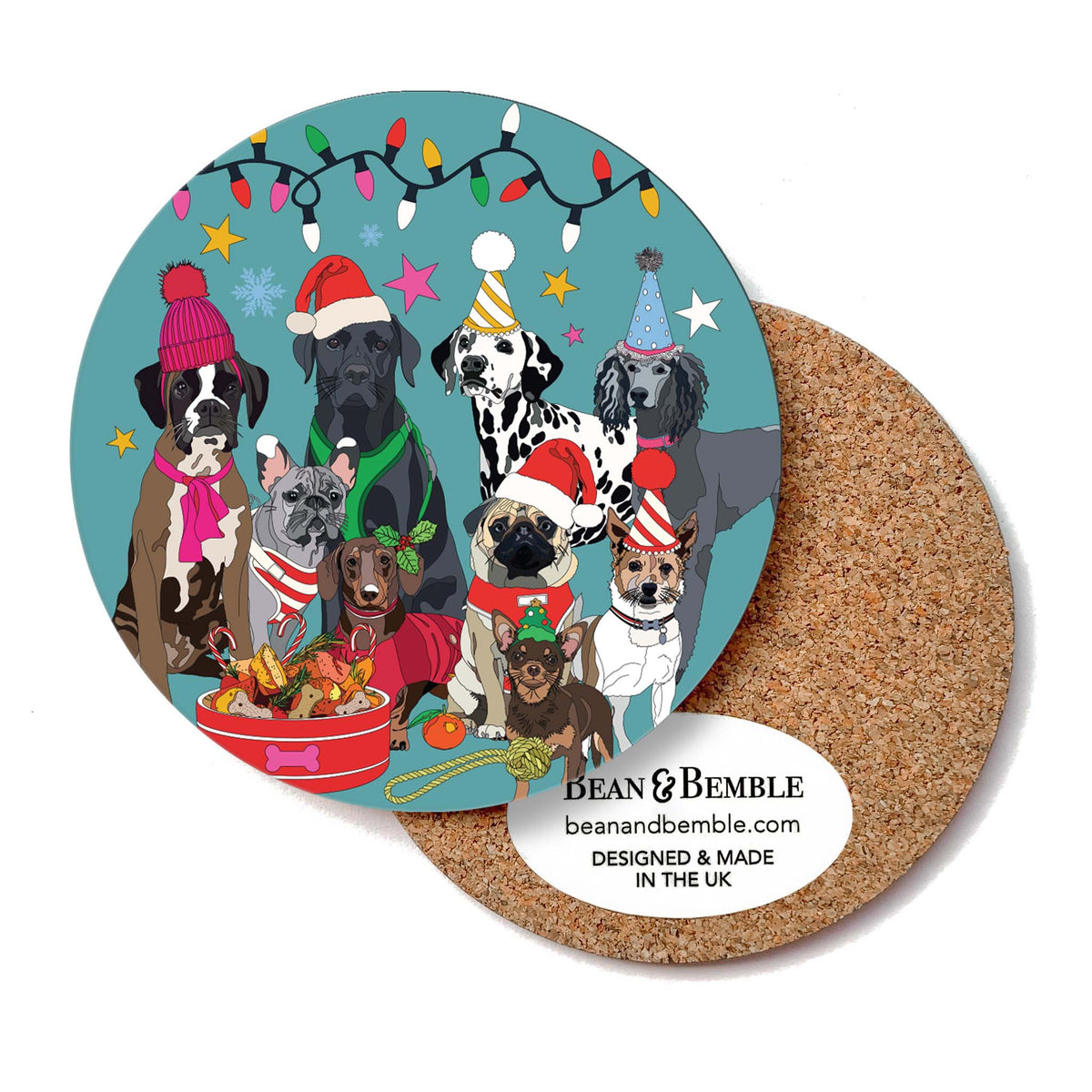 Round cork-backed coaster with illustrated winter dogs wearing party hats