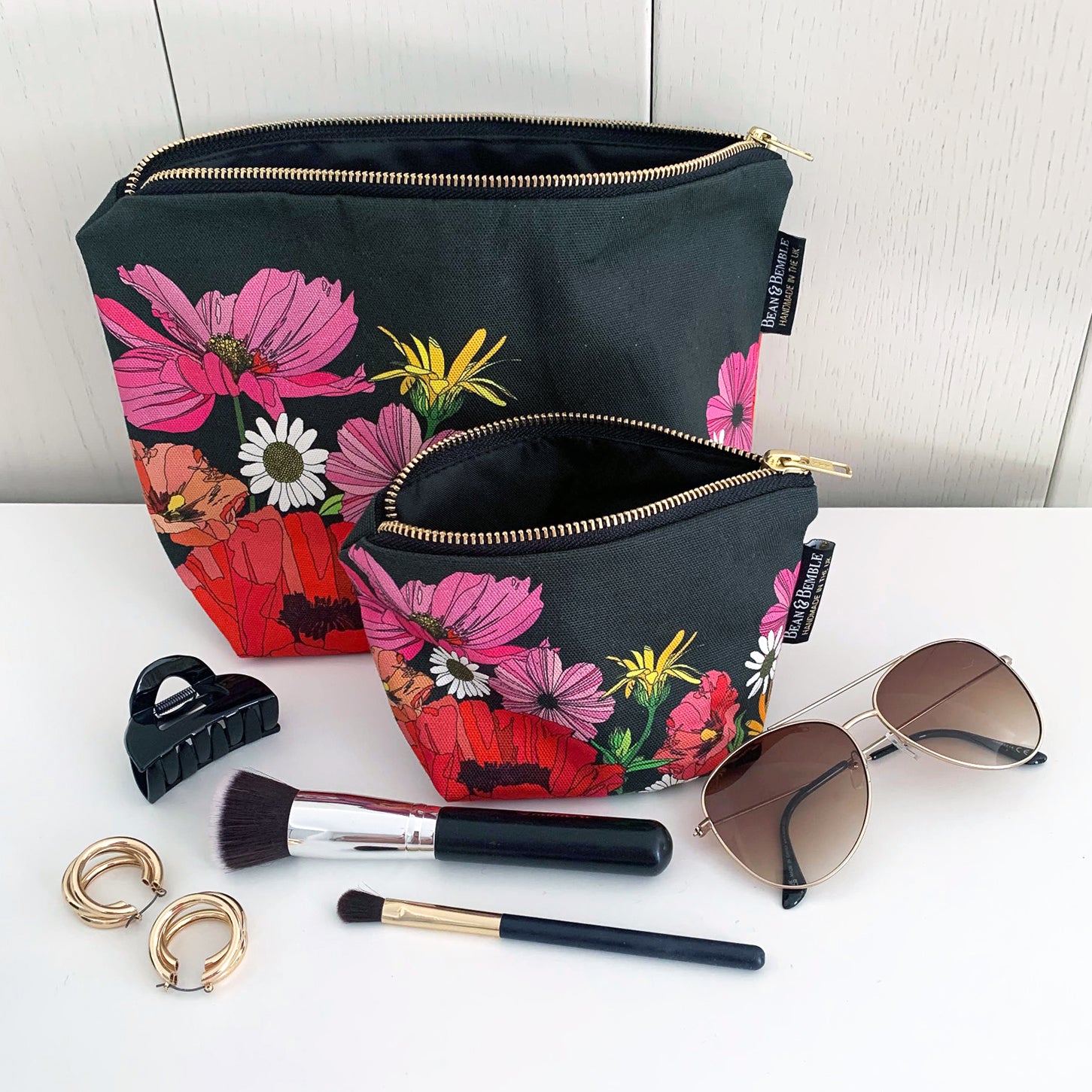 Handmade summer poppies machine washable cosmetic and makeup bags with a waterproof lining. 100% cotton.