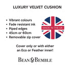 A product information graphic for a Bean & Bemble 'Luxury Velvet Cushion'. The graphic features a white background with black text detailing product features (vibrant colors, fade resistant ink, piped edges, 45cm or 60cm, removable zip cover) and a circular Union Jack badge with a red banner reading 'MADE IN THE UK'.