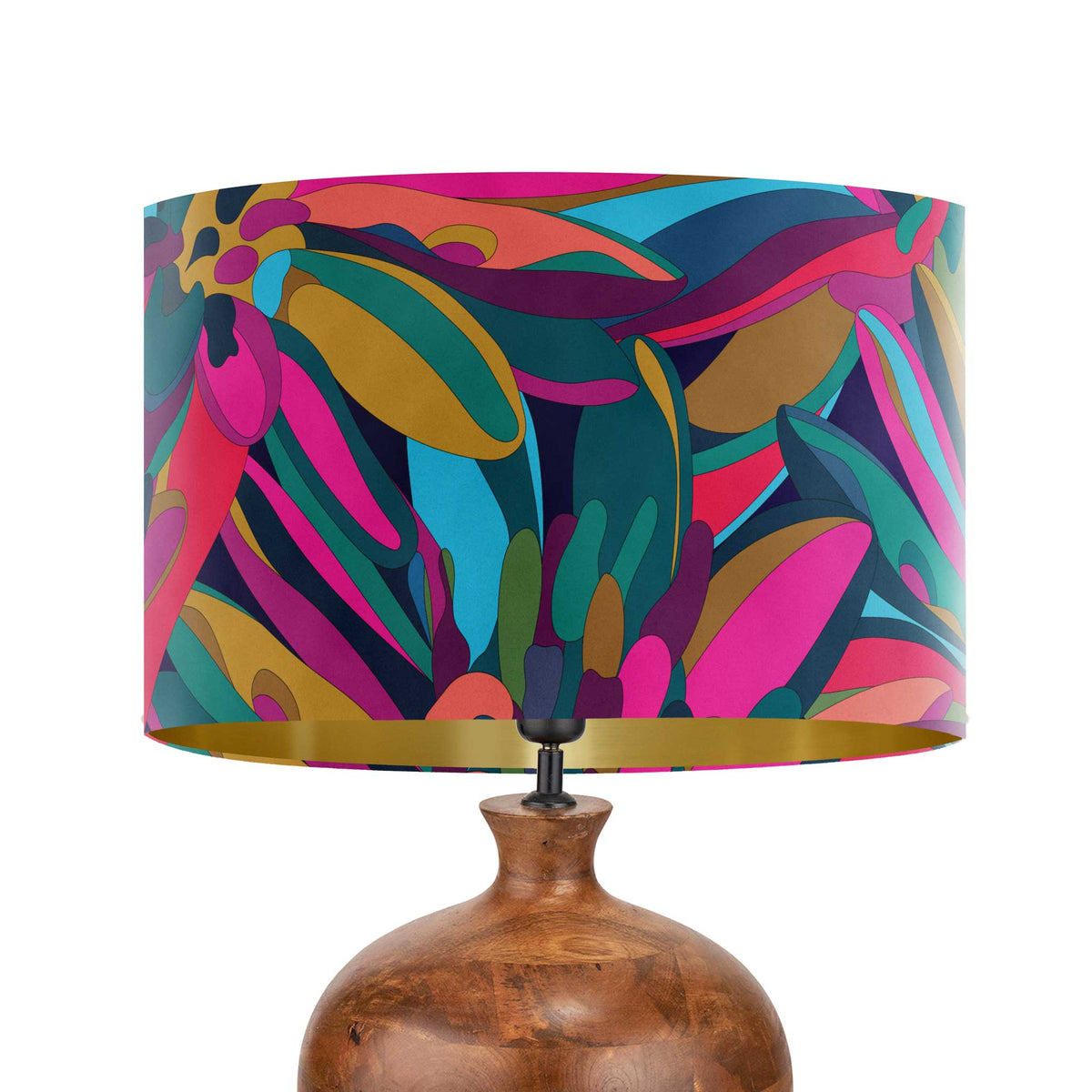 A table lamp with a colorful abstract botanical patterned drum shade and a textured brown ceramic base, shown against a solid white background.