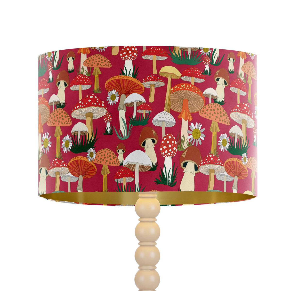 Mad Mushrooms red velvet drum lampshade designed for a table lamp or floor lamp base, featuring colourful mushrooms, toadstools and daisies with a matte gold inner.