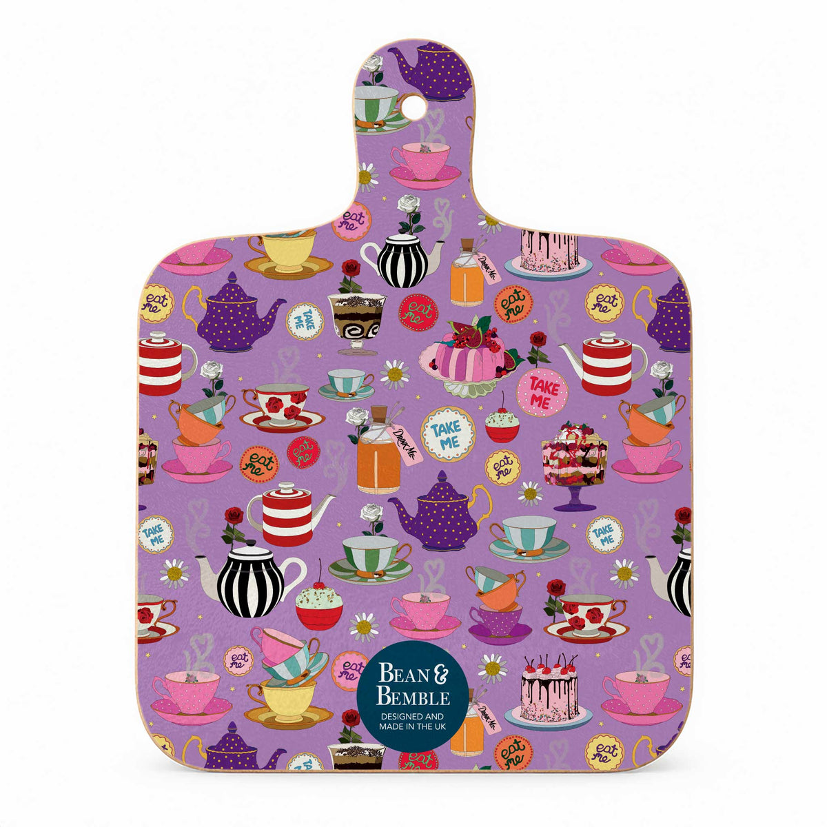  Reverse of a mini melamine chopping boards. It is lilac with a cakes and puddings pattern.