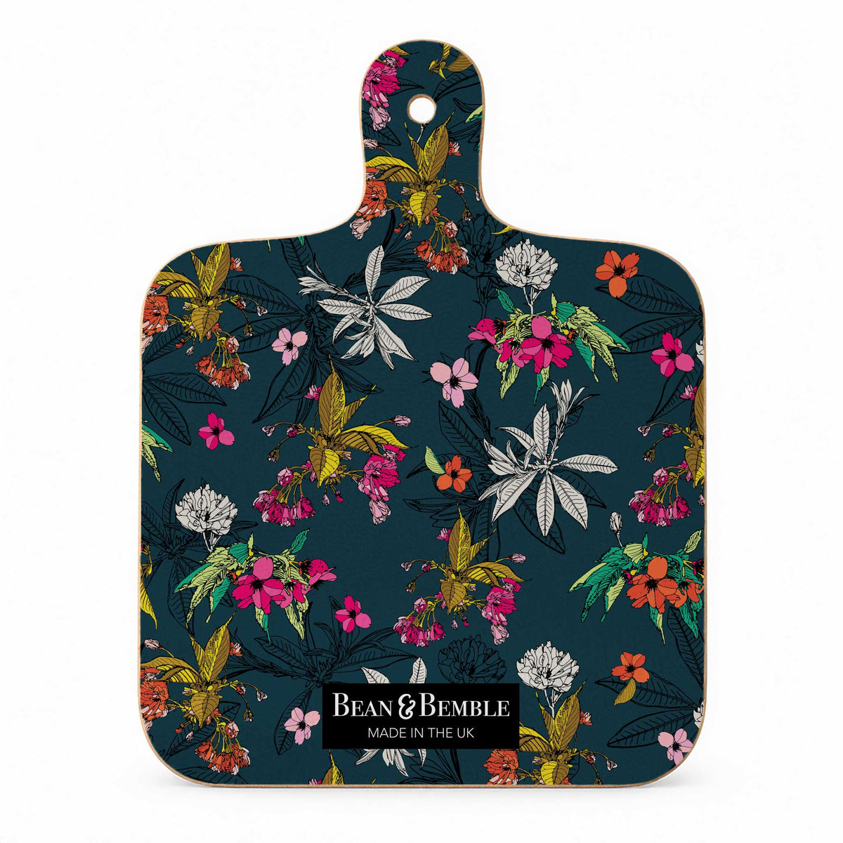 Reverse side of a mini melamine chopping board with a hand Illustrated floral pattern on navy blue.
