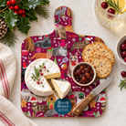 Cheese board mockup:
Christmas Cats mini melamine cheese board styled with Brie, crackers, chutney and a cheese knife, surrounded by festive greenery, berries and Christmas details.