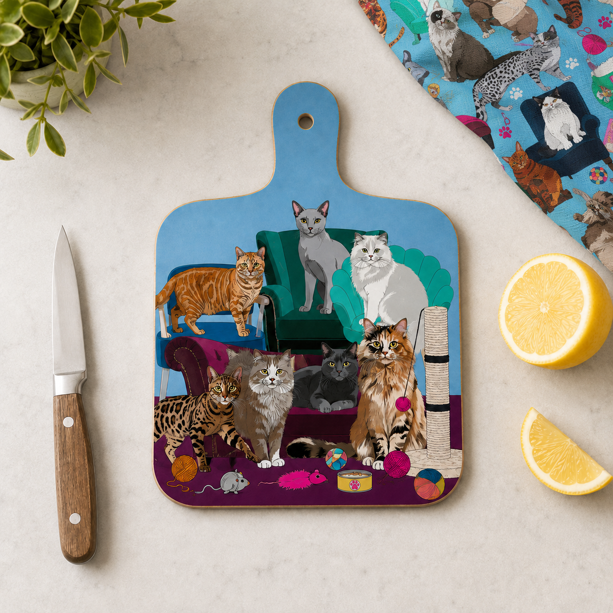 Cat chopping board with blue handle and framed multicolor cat collage