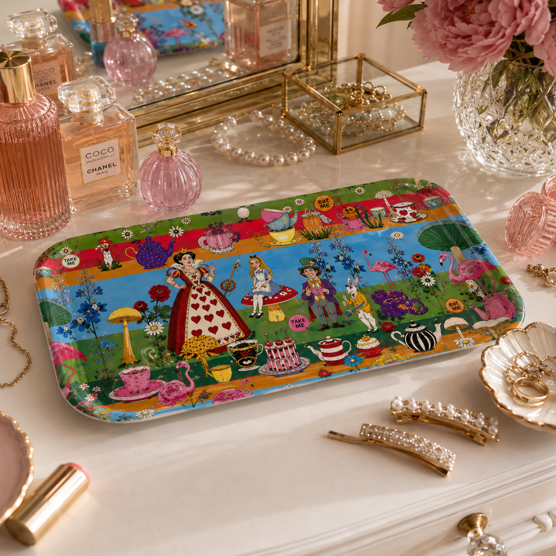 Alice in Wonderland small melamine tray styled on a dressing table with perfume, jewellery and decorative accessories.