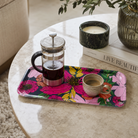 Vivid Blooms small floral melamine tray holding olive oil, salt and pepper on a white kitchen worktop.