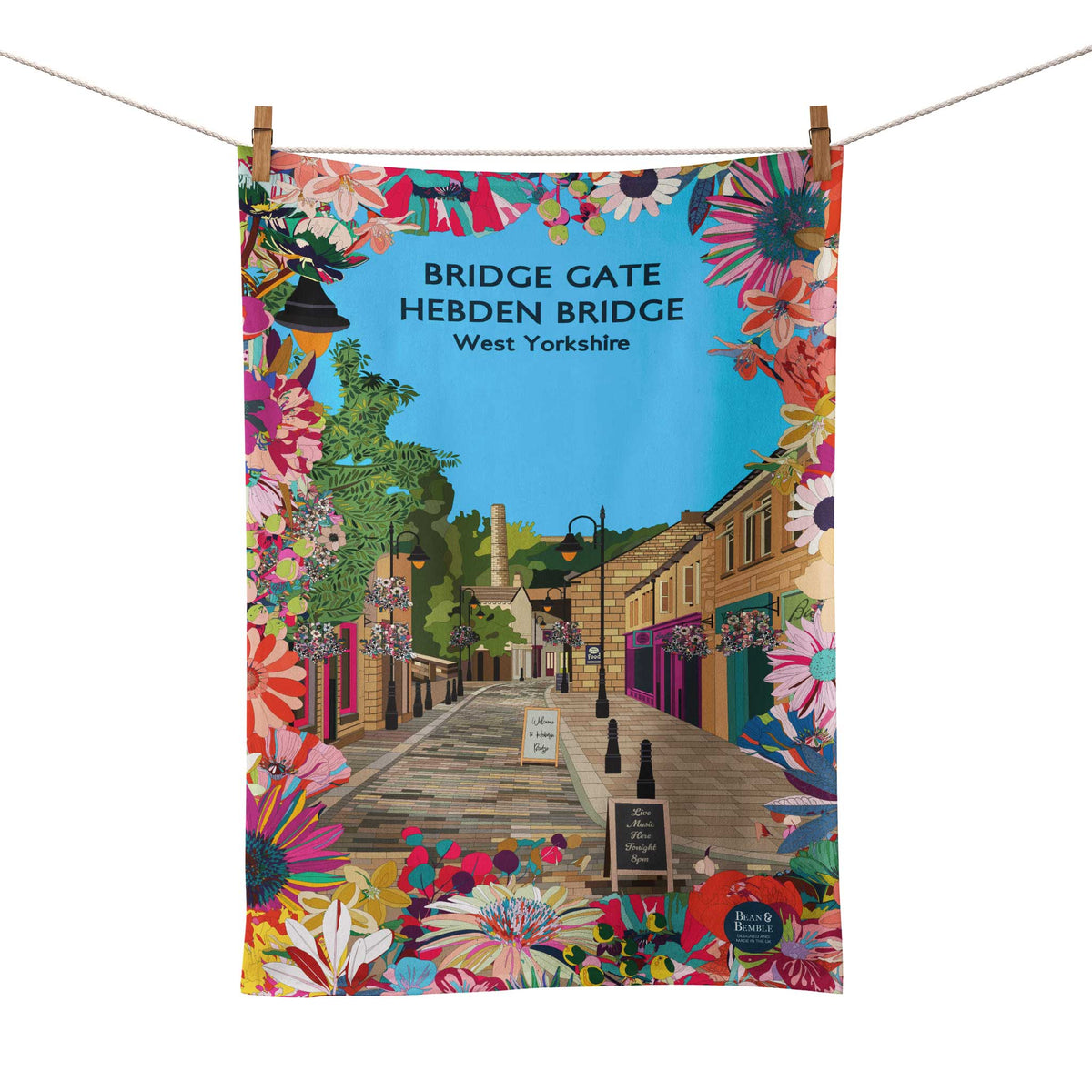 Bridge Gate Hebden Bridge organic cotton tea towel with colourful floral border and illustrated West Yorkshire street scene.